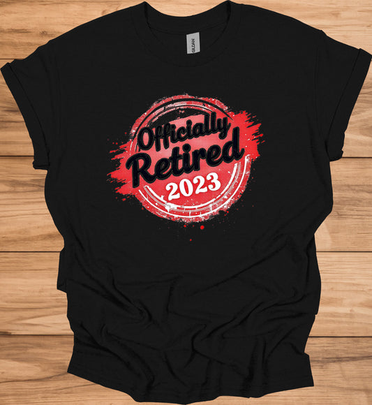 Officially Retired 2023: Vibrant Red Circular Design, Bold Black Script Text, Distressed Retirement Artwork - Graphic Tee Shirt