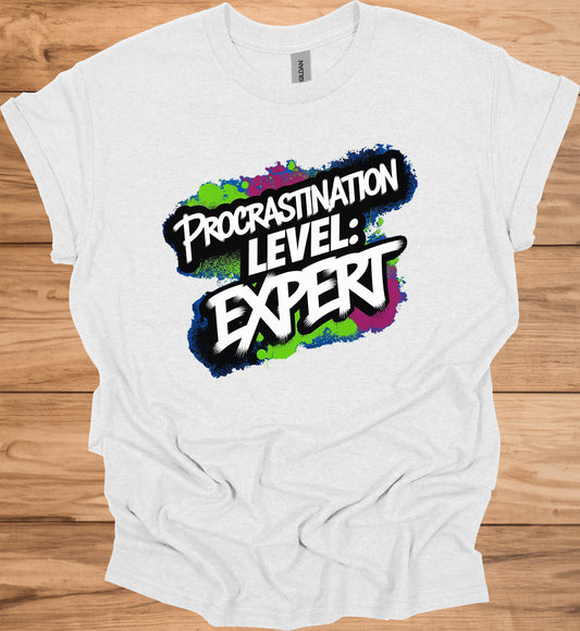 Procrastination Prowess: Graffiti-Style Typography, Vibrant Splatter Background, Humorous Self-Deprecating Message - Graphic Tee Shirt