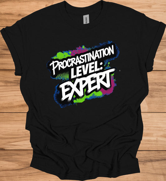 Procrastination Prowess: Graffiti-Style Typography, Vibrant Splatter Background, Humorous Self-Deprecating Message - Graphic Tee Shirt