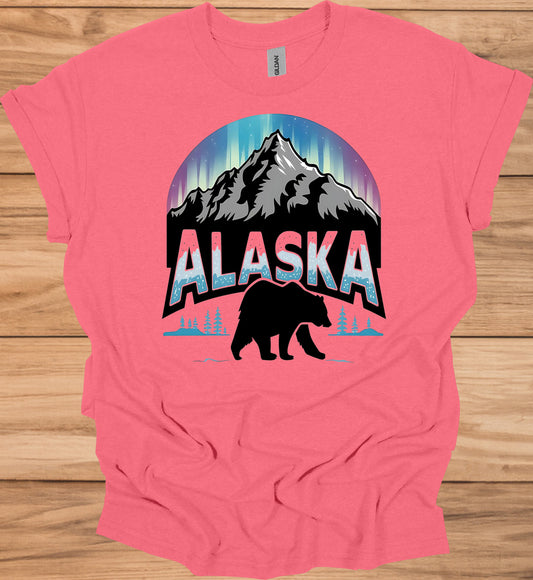 Alaska's Wilderness Wonder: Northern Lights Over Mountains, Bear Silhouette Graphic, Icy Text Design - Graphic Tee Shirt