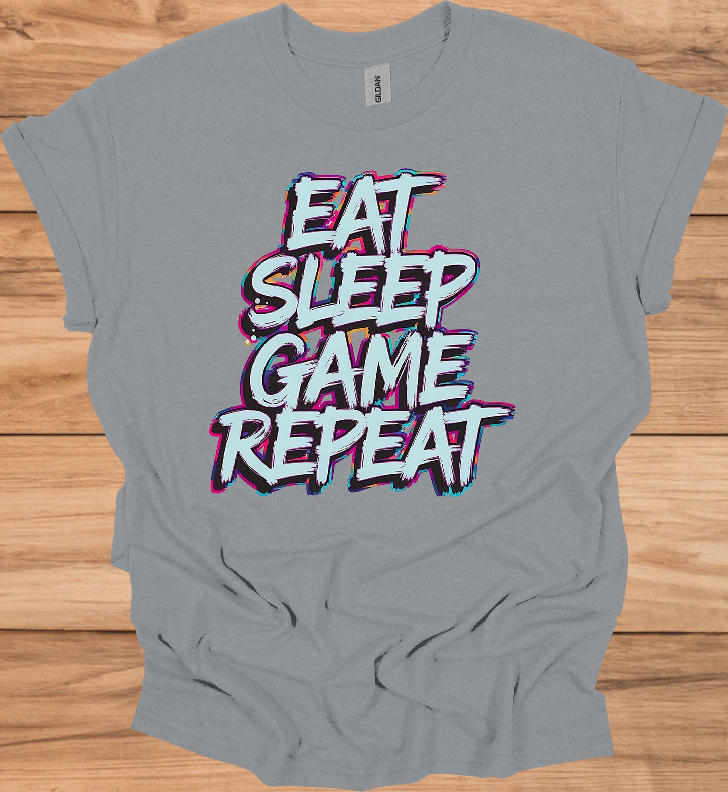 Gamer's Mantra: Eat Sleep Game Repeat, Graffiti-Style Typography, Vibrant 3D Design, Gaming Lifestyle Artwork - Graphic Tee Shirt