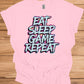 Gamer's Mantra: Eat Sleep Game Repeat, Graffiti-Style Typography, Vibrant 3D Design, Gaming Lifestyle Artwork - Graphic Tee Shirt