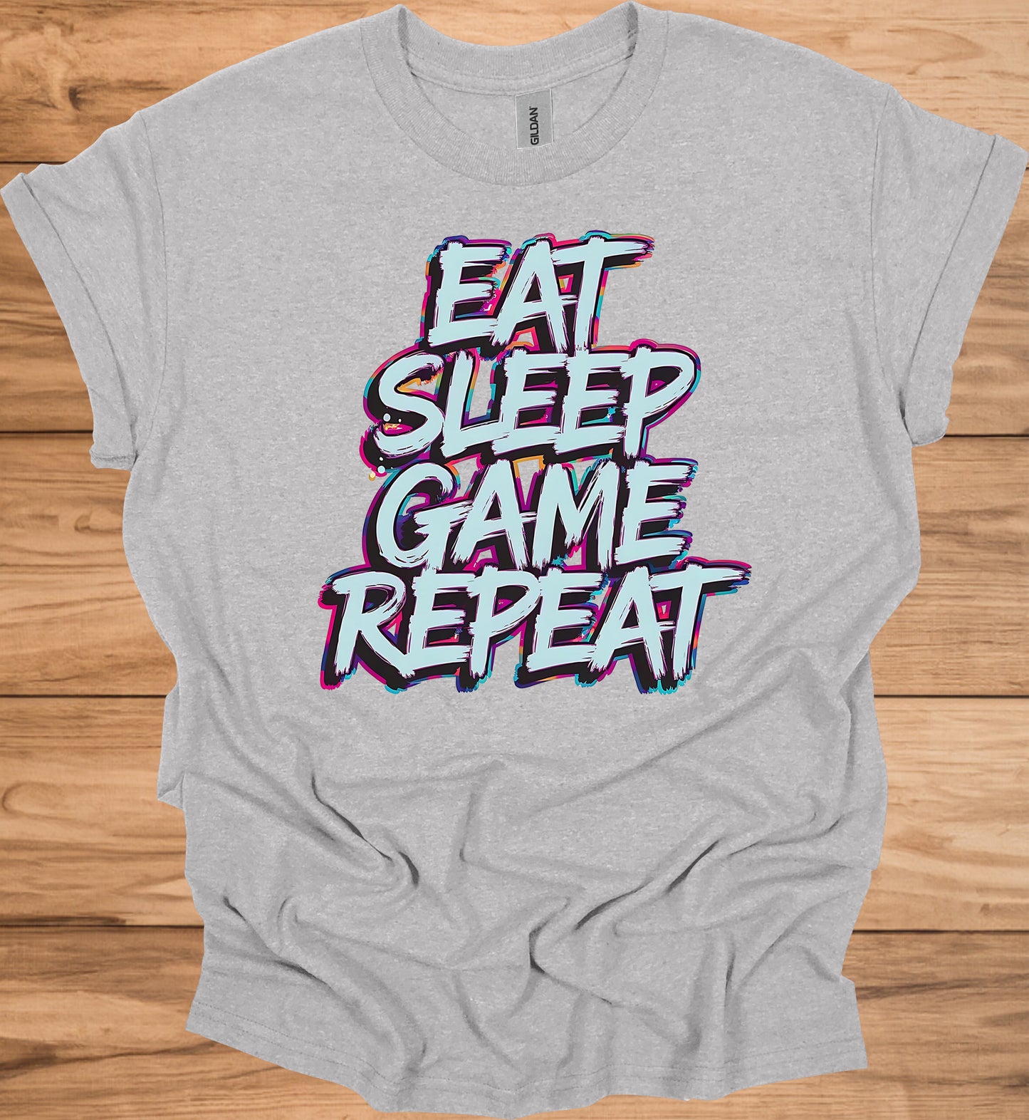 Gamer's Mantra: Eat Sleep Game Repeat, Graffiti-Style Typography, Vibrant 3D Design, Gaming Lifestyle Artwork - Graphic Tee Shirt
