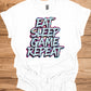 Gamer's Mantra: Eat Sleep Game Repeat, Graffiti-Style Typography, Vibrant 3D Design, Gaming Lifestyle Artwork - Graphic Tee Shirt