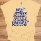 Gamer's Mantra: Eat Sleep Game Repeat, Graffiti-Style Typography, Vibrant 3D Design, Gaming Lifestyle Artwork - Graphic Tee Shirt
