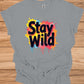 Stay Wild: Vibrant Typographic Art, Graffiti-Inspired Design, Colorful Paint Splatter Background - Graphic Tee Shirt