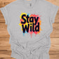 Stay Wild: Vibrant Typographic Art, Graffiti-Inspired Design, Colorful Paint Splatter Background - Graphic Tee Shirt