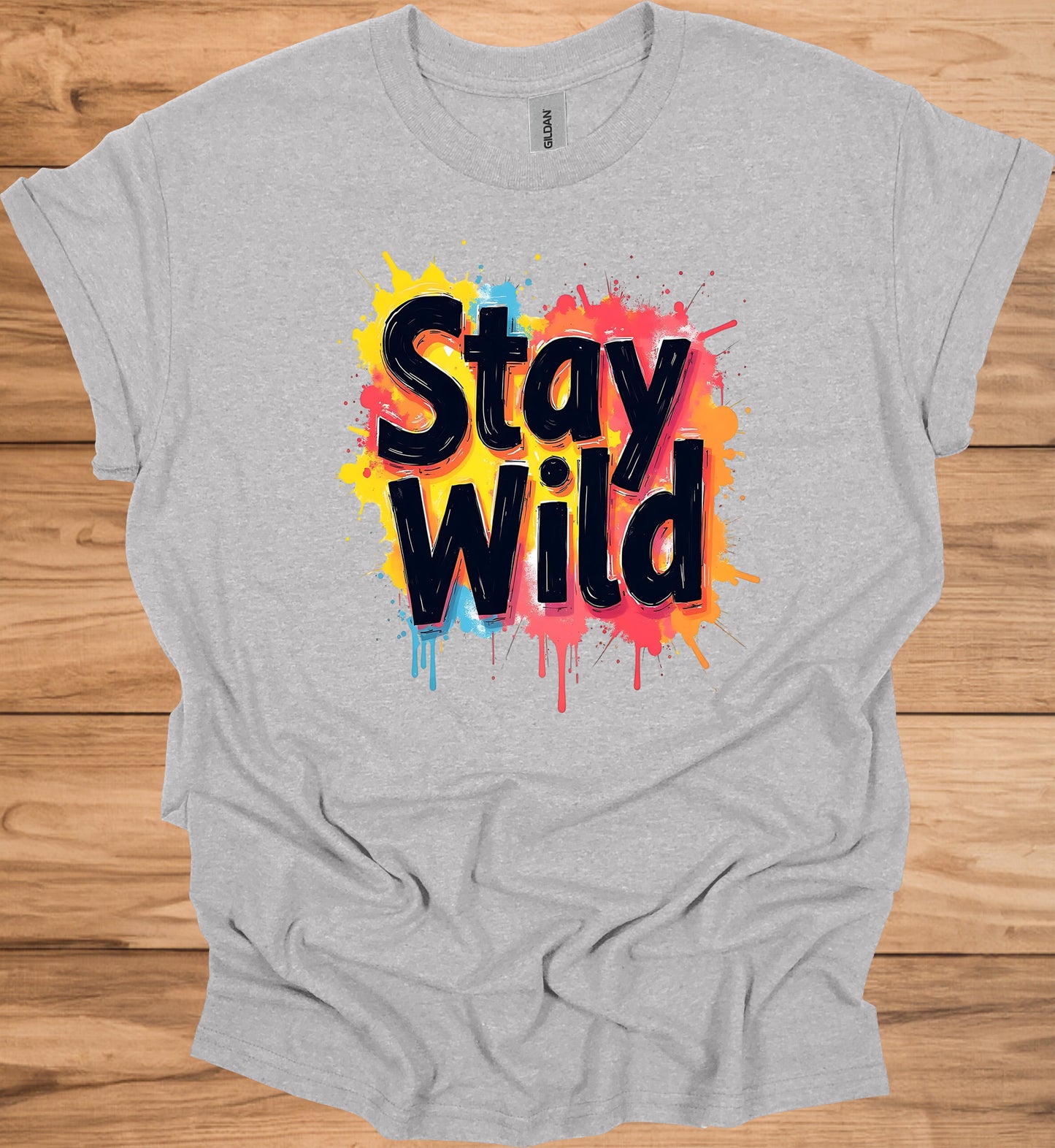 Stay Wild: Vibrant Typographic Art, Graffiti-Inspired Design, Colorful Paint Splatter Background - Graphic Tee Shirt