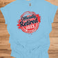 Officially Retired 2023: Vibrant Red Circular Design, Bold Black Script Text, Distressed Retirement Artwork - Graphic Tee Shirt