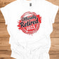 Officially Retired 2023: Vibrant Red Circular Design, Bold Black Script Text, Distressed Retirement Artwork - Graphic Tee Shirt