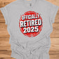 Officially Retired 2025: Red Circular Stamp Design, Distressed White Typography, Vintage Grunge Aesthetic - Graphic Tee Shirt