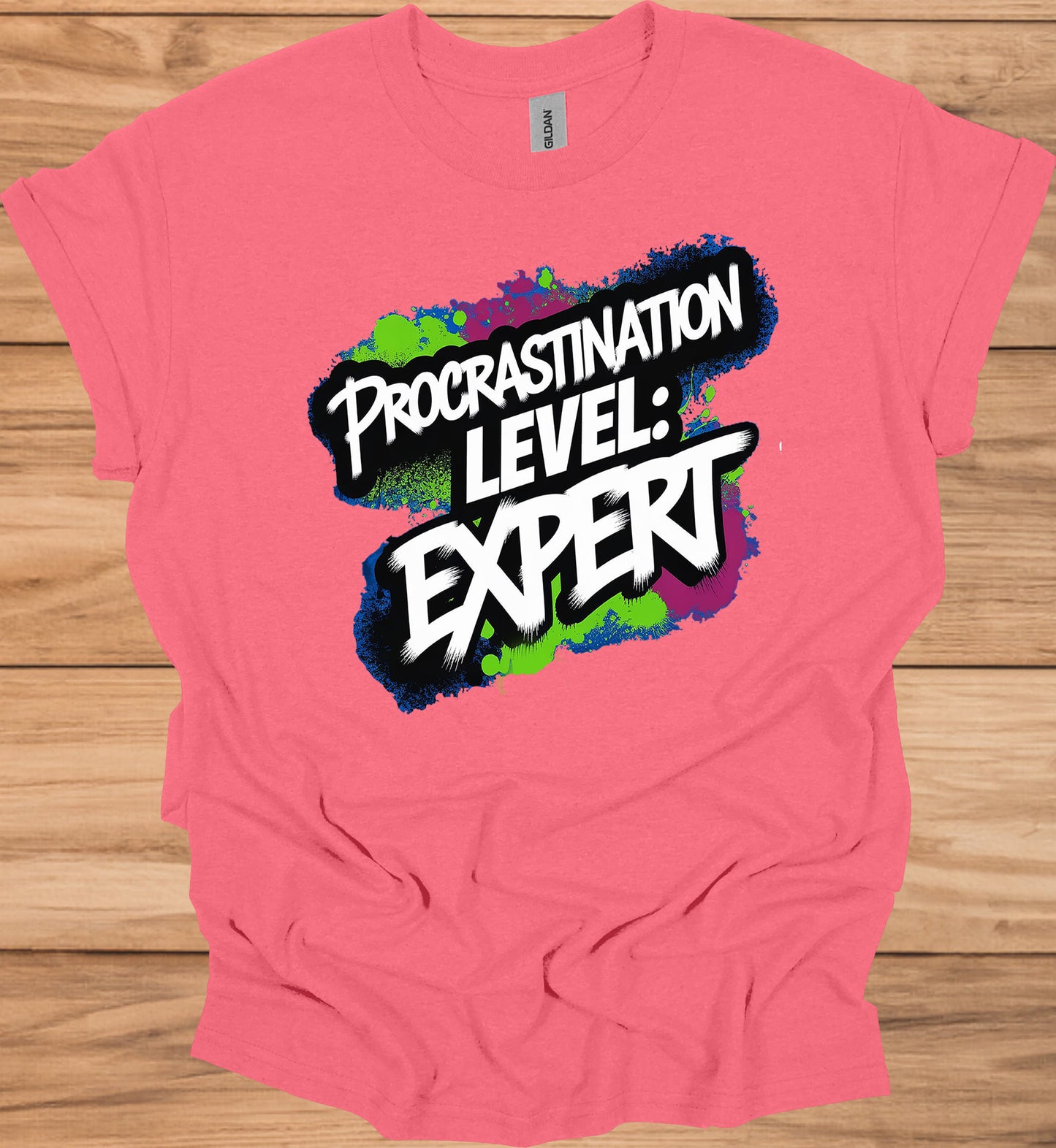 Procrastination Prowess: Graffiti-Style Typography, Vibrant Splatter Background, Humorous Self-Deprecating Message - Graphic Tee Shirt