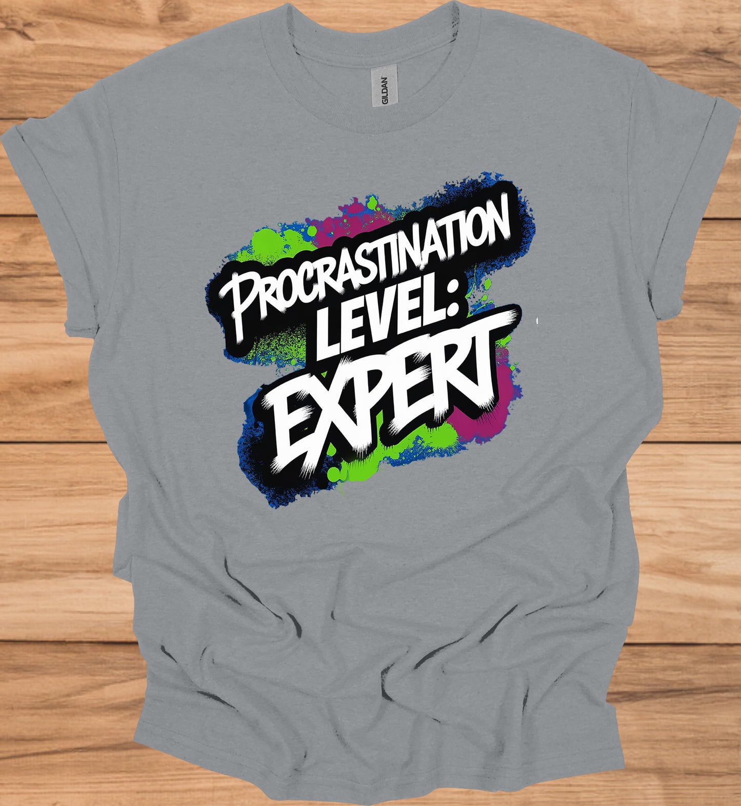 Procrastination Prowess: Graffiti-Style Typography, Vibrant Splatter Background, Humorous Self-Deprecating Message - Graphic Tee Shirt