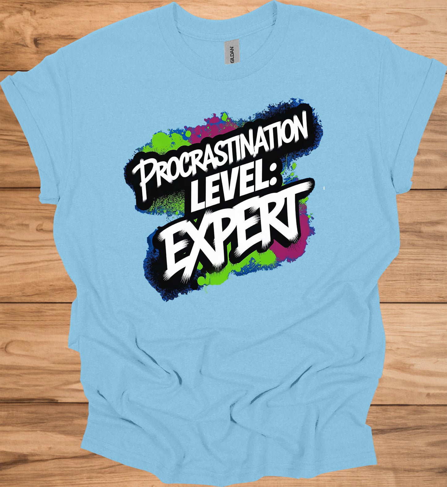Procrastination Prowess: Graffiti-Style Typography, Vibrant Splatter Background, Humorous Self-Deprecating Message - Graphic Tee Shirt