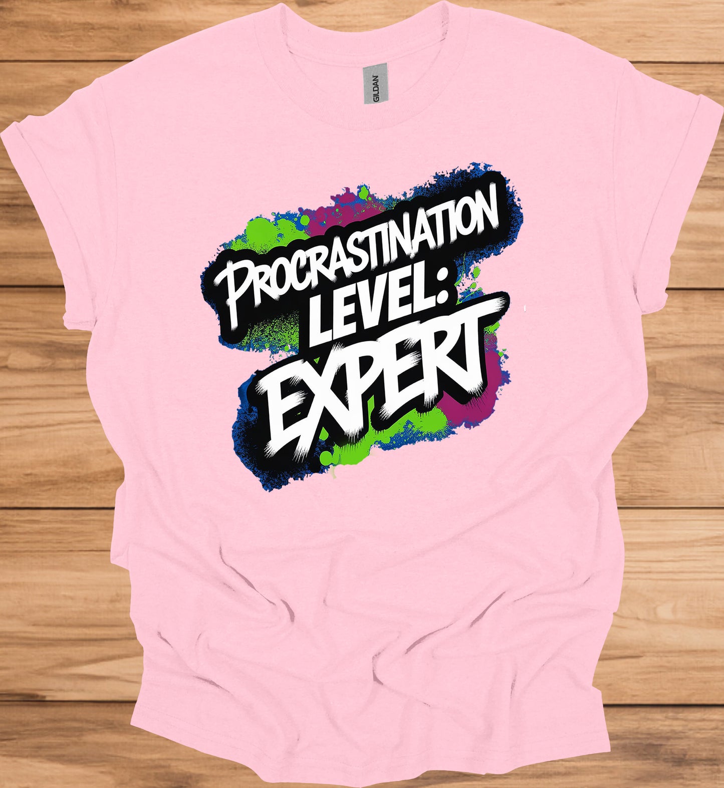 Procrastination Prowess: Graffiti-Style Typography, Vibrant Splatter Background, Humorous Self-Deprecating Message - Graphic Tee Shirt