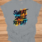 Sweat Smile Repeat: Motivational Fitness Quote, Graffiti Style Typography, Vibrant Colorful Background - Graphic Tee Shirt