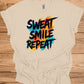 Sweat Smile Repeat: Motivational Fitness Quote, Graffiti Style Typography, Vibrant Colorful Background - Graphic Tee Shirt