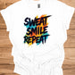 Sweat Smile Repeat: Motivational Fitness Quote, Graffiti Style Typography, Vibrant Colorful Background - Graphic Tee Shirt