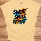 Sweat Smile Repeat: Motivational Fitness Quote, Graffiti Style Typography, Vibrant Colorful Background - Graphic Tee Shirt