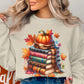 Cozy Autumn Pumpkin and Books Graphic Sweatshirt product